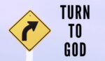 Image of right turn sign with Turn to God